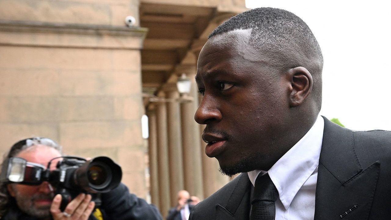 Manchester City and France international footballer Benjamin Mendy (C) arrives to Chester Crown Court for a pre-trial hearing in Chester, northwest England, on May 23, 2022. - Mendy, who has been charged with seven counts of rape, was freed on bail last month with "stringent" conditions, including the surrender of his passport. Mendy, who is accused by five women of seven counts of rape and one of sexual assault, has been in custody since being arrested and charged on August 26 last year.