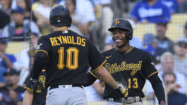 LOS ANGELES, CA - JUNE 01: Bryan Reynolds #10 of the Pittsburgh Pirates celebrates his two-run home run with Ke'Bryan Hayes #13 against starting pitcher Mitch White of the Los Angeles Dodgers in the fifth inning at Dodger Stadium on June 1, 2022 in Los Angeles, California.