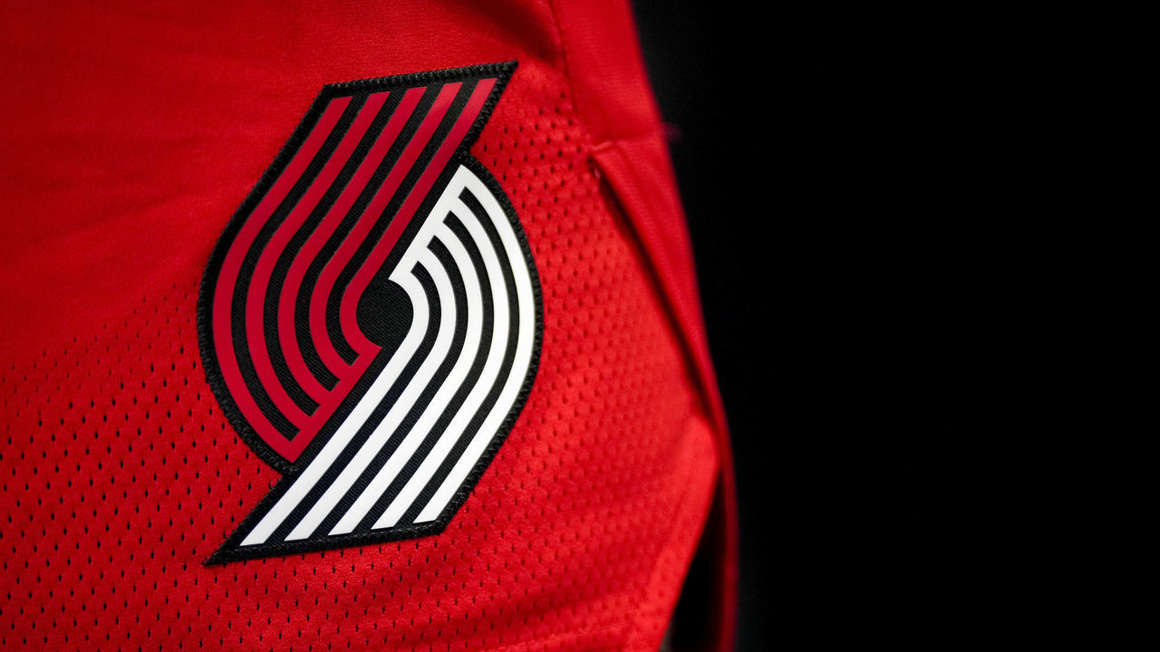 DETROIT, MICHIGAN - MARCH 21: The Portland Trail Blazers logo is pictured during the third quarter against the Detroit Pistons at Little Caesars Arena on March 21, 2022 in Detroit, Michigan.