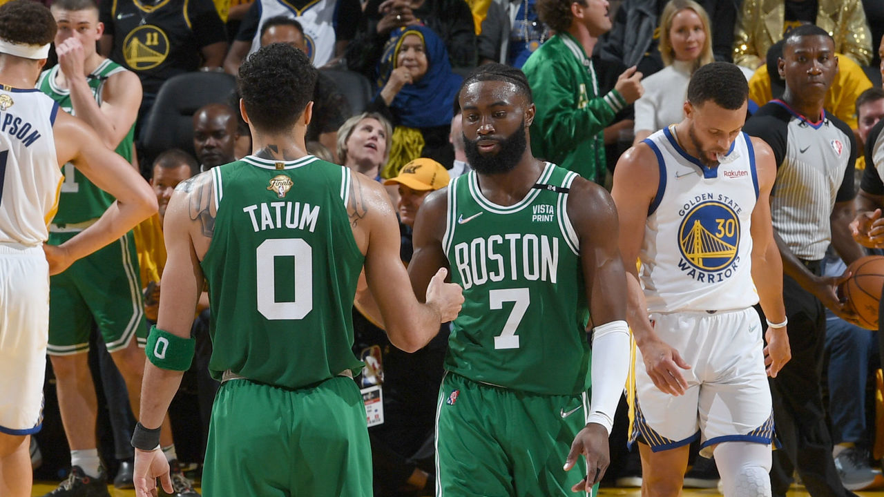 SAN FRANCISCO, CA - JUNE 2: Jayson Tatum #0 high fives Jaylen Brown #7 of the Boston Celtics during Game One of the 2022 NBA Finals on June 2, 2022 at Chase Center in San Francisco, California. NOTE TO USER: User expressly acknowledges and agrees that, by downloading and or using this photograph, user is consenting to the terms and conditions of Getty Images License Agreement. Mandatory Copyright Notice: Copyright 2022 NBAE