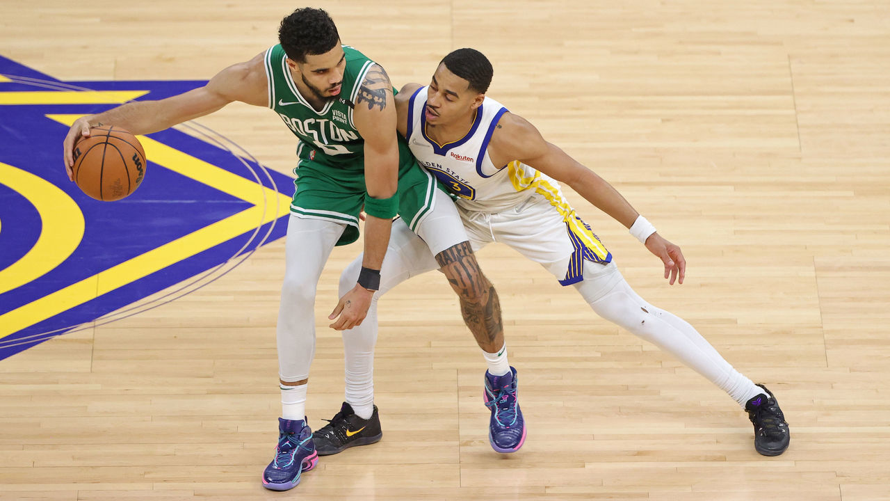 SAN FRANCISCO, CA - JUNE 2: Jayson Tatum #0 of the Boston Celtics dribbles the ball against Jordan Poole #3 of the Golden State Warriors during Game One of the 2022 NBA Finals on June 2, 2022 at Chase Center in San Francisco, California. NOTE TO USER: User expressly acknowledges and agrees that, by downloading and or using this photograph, user is consenting to the terms and conditions of Getty Images License Agreement. Mandatory Copyright Notice: Copyright 2022 NBAE