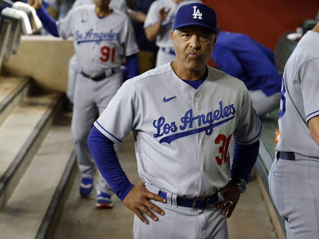 Los Angeles Dodgers manager Dave Roberts (30) looks on before the first  inning of a baseball