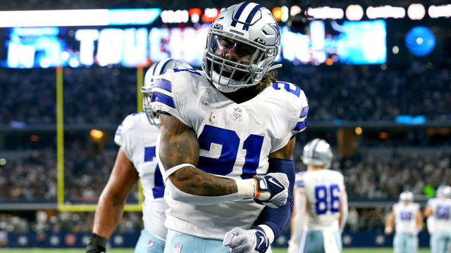 ARLINGTON, TEXAS - DECEMBER 26: Ezekiel Elliott #21 of the Dallas Cowboys celebrates after rushing for a touchdown during the second quarter against the Washington Football Team at AT&T Stadium on December 26, 2021 in Arlington, Texas.