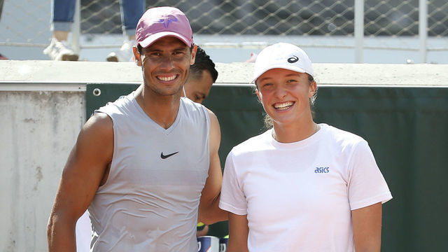 PARIS, FRANCE - MAY 29: Winners of the 2020 French Open seven months ago, Rafael Nadal of Spain and Iga Swiatek of Poland practice together for 20 minutes on Court 5 ahead of the French Open 2021, Grand Slam tennis tournament at Roland-Garros stadium on May 29, 2021 in Paris, France.