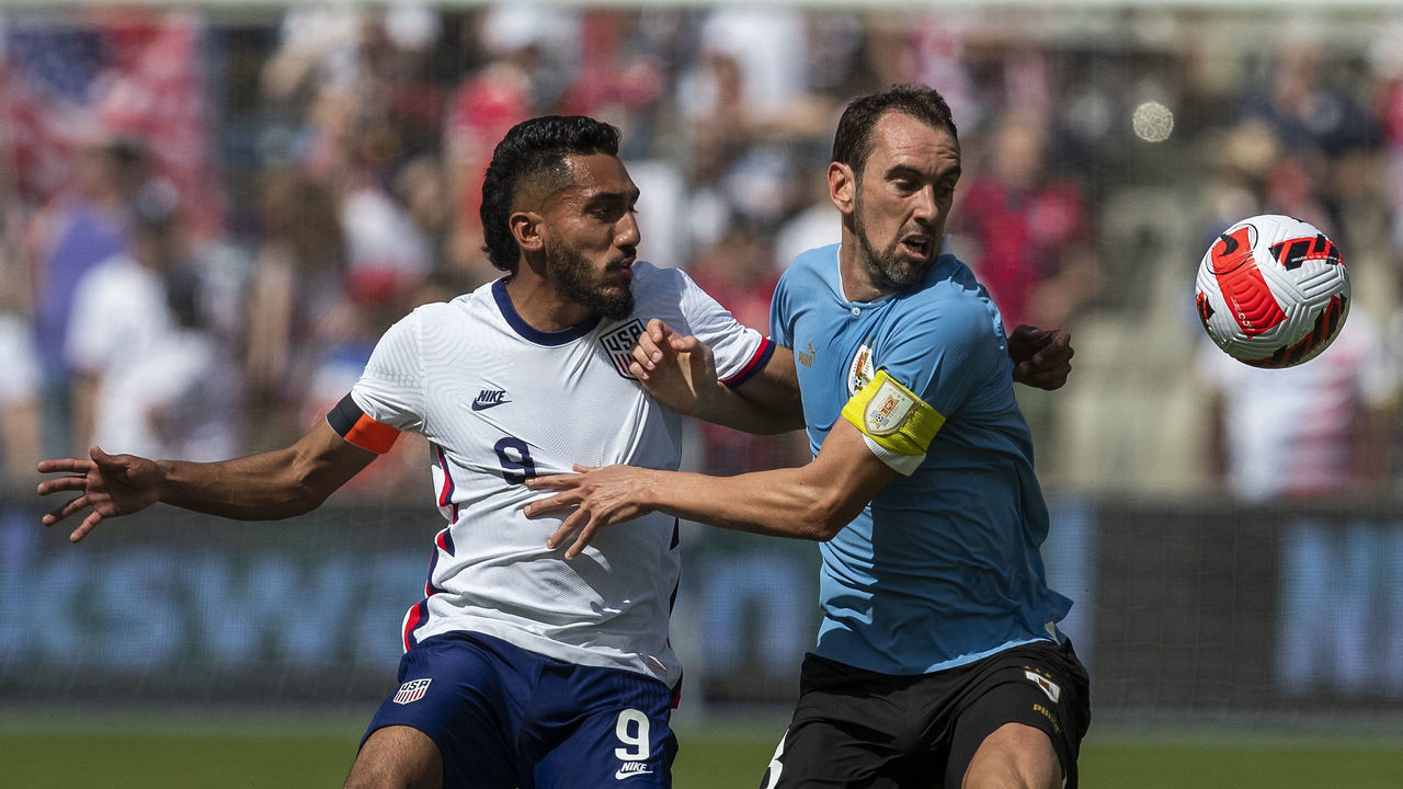 KANSAS CITY, KS - JUNE 05: United States forward Jesus Ferreira (9) chases down Uruguay defender Diego Godin (3) during the match between the USMNT and Uruguay on Sunday June 5th, 2022 at Childrens Mercy Park in Kansas City, KS.