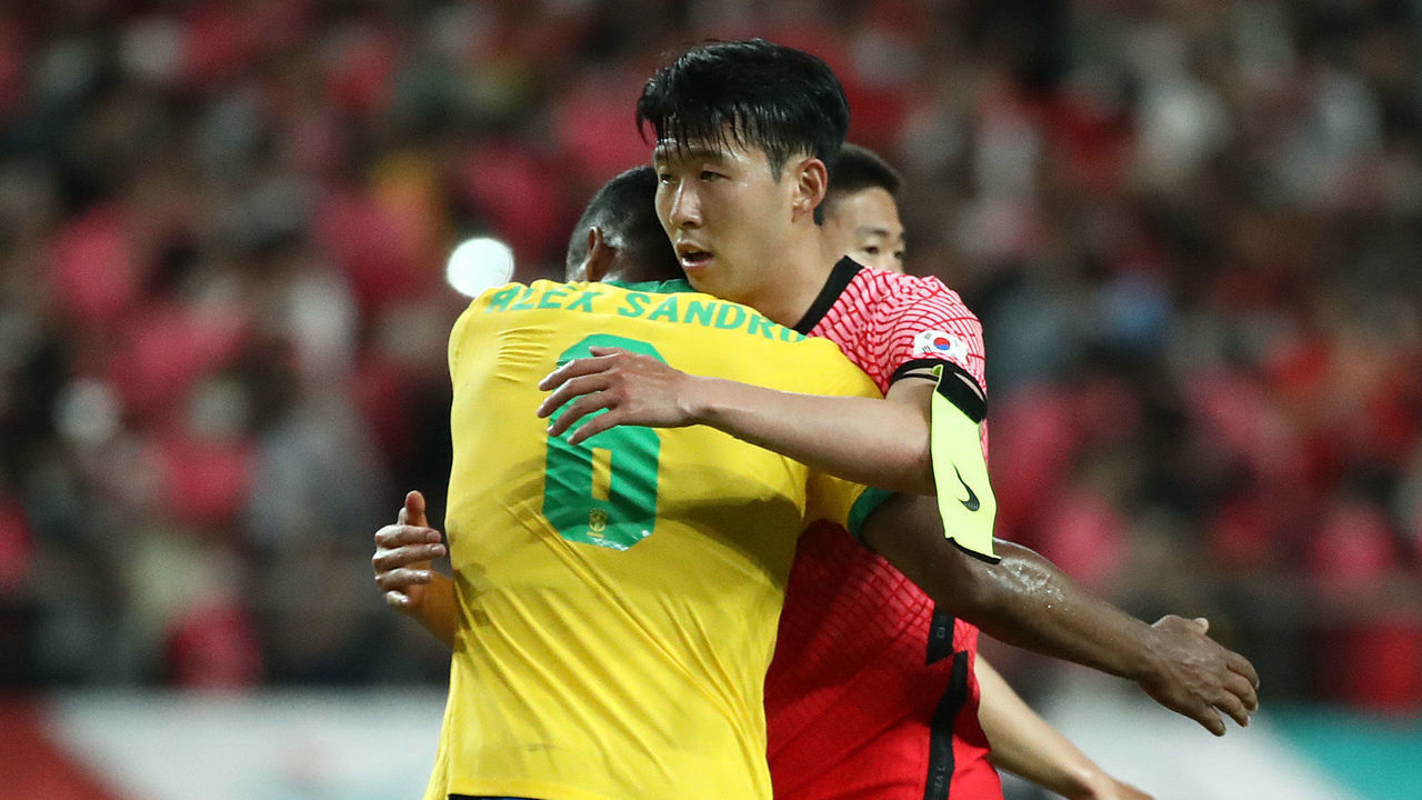 SEOUL, SOUTH KOREA - JUNE 02: Son Heung-min of South Korea hugs with Alex Sandro of Brazil after the international friendly match between South Korea and Brazil at Seoul World Cup Stadium on June 02, 2022 in Seoul, South Korea.