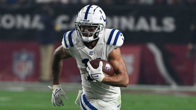 GLENDALE, ARIZONA - DECEMBER 25: Michael Pittman J #11 of the Indianapolis Colts runs with the ball against the Arizona Cardinals at State Farm Stadium on December 25, 2021 in Glendale, Arizona.