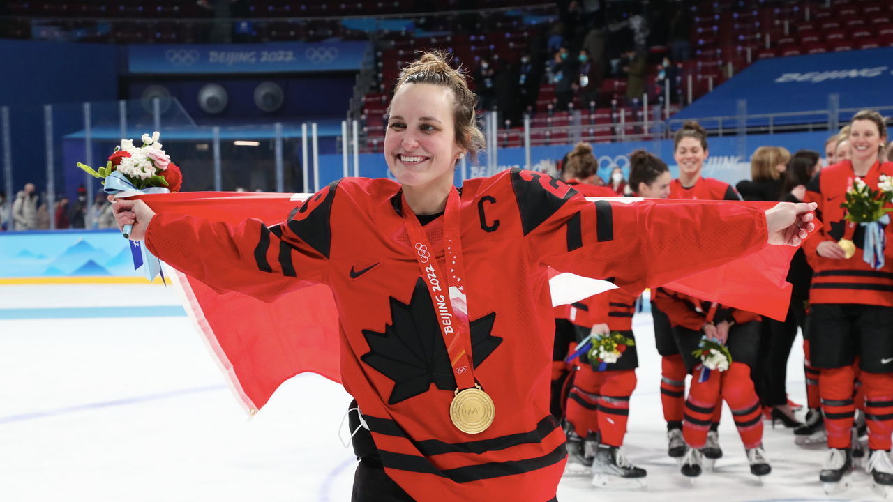 BEIJING, CHINA - FEBRUARY 17: Marie-Philip Poulain #29 of Team Canada celebrates with her gold medal after winning the Women's Ice Hockey Gold Medal match between Team Canada and Team United States on Day 13 of the Beijing 2022 Winter Olympic Games at Wukesong Sports Centre on February 17, 2022 in Beijing, China. (