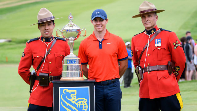 ANCASTER, ON - JUNE 09: Rory McIlroy poses with two Canadian Mounties and the trophy after winning during the RBC Canadian Open at Hamilton Golf and Country Club on June 9, 2019 in Ancaster, ON, Canada.