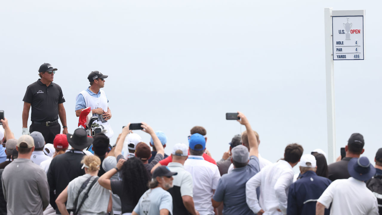 SAN DIEGO, CALIFORNIA - JUNE 18: Phil Mickelson of the United States and caddie Tim Mickelson wait on the fourth tee during the second round of the 2021 U.S. Open at Torrey Pines Golf Course (South Course) on June 18, 2021 in San Diego, California.
