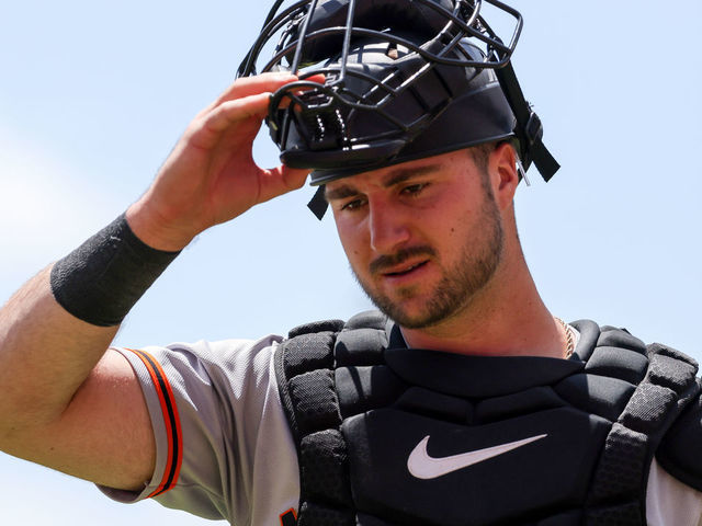 CINCINNATI, OHIO - MAY 29: Joey Bart #21 of the San Francisco Giants walks across the field in the fourth inning against the Cincinnati Reds at Great American Ball Park on May 29, 2022 in Cincinnati, Ohio.