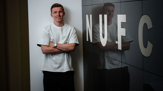 NEWCASTLE UPON TYNE, ENGLAND - JUNE 08: Matt Targett poses for photographs after signing a new permanent move to St. James Park on June 08, 2022 in Newcastle upon Tyne, England.