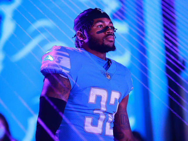 DETROIT, MICHIGAN - OCTOBER 17: D'Andre Swift #32 of the Detroit Lions looks on before the game against the Cincinnati Bengals at Ford Field on October 17, 2021 in Detroit, Michigan.
