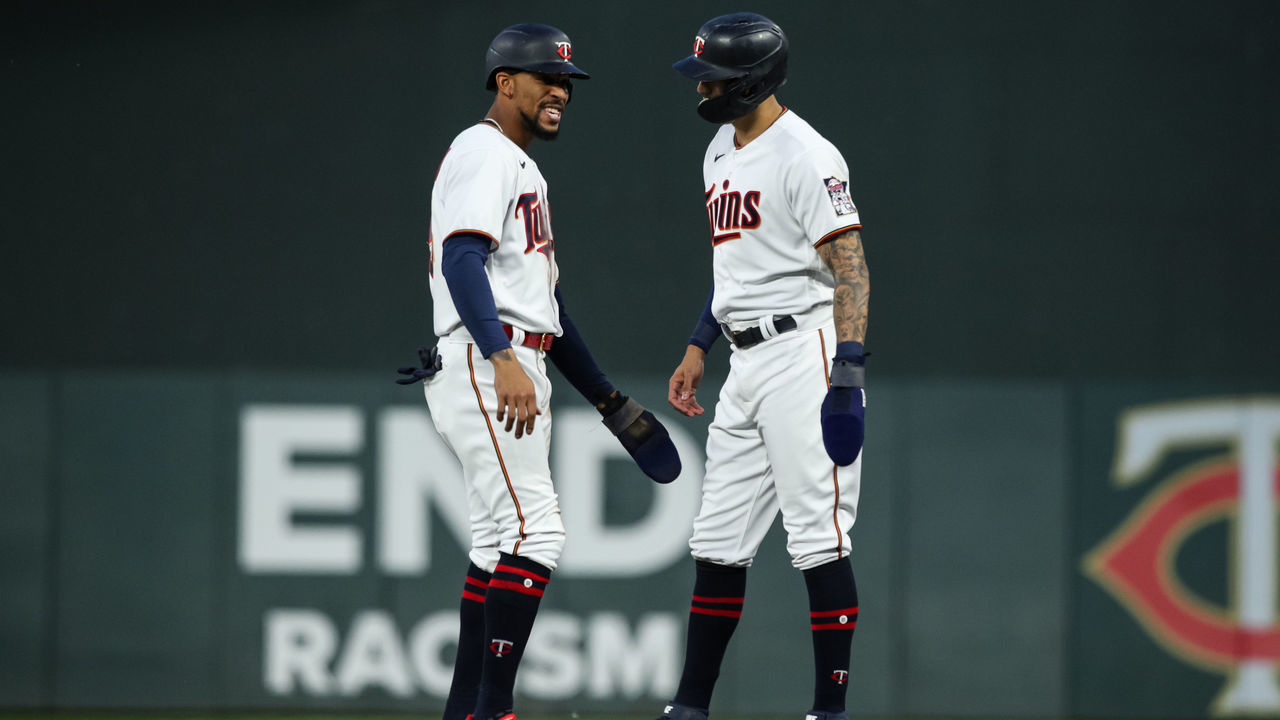 MINNEAPOLIS, MN - JUNE 08: Byron Buxton #25 (L) and Carlos Correa #4 of the Minnesota Twins interact in the seventh inning of the game against the New York Yankees at Target Field on June 8, 2022 in Minneapolis, Minnesota. The Twins defeated the Yankees 8-1.