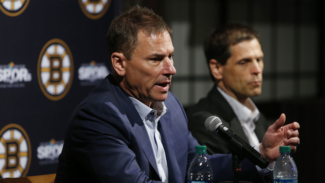 BOSTON - JUNE 17: Boston Bruins coach Bruce Cassidy, left, and general manager Don Sweeney speak during the end of the year press conference at TD Garden in Boston on June 17, 2019.