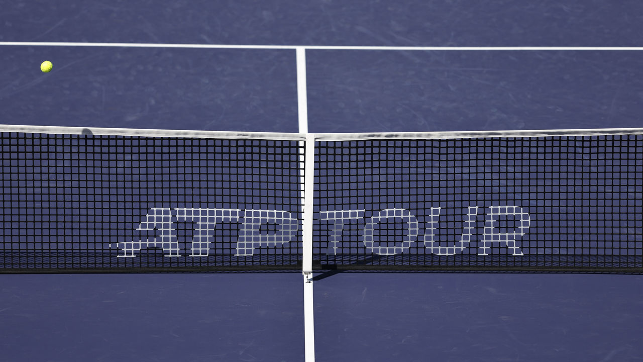 INDIAN WELLS, CALIFORNIA - MARCH 16: A general view of a tennis ball flying over the net during a match between Rafael Nadal of Spain and Reilly Opelka of the United States in their quarter finals match on Day 10 of the BNP Paribas Open at the Indian Wells Tennis Garden on March 16, 2022 in Indian Wells, California.