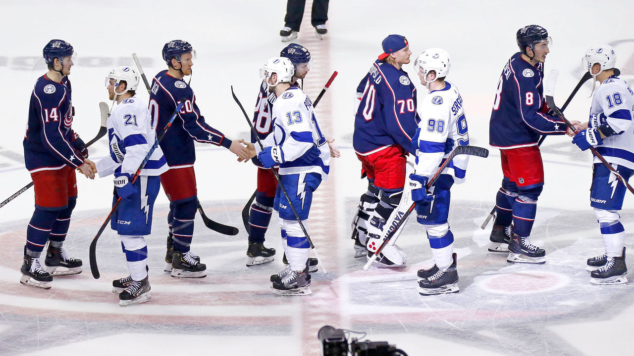 COLUMBUS, OH - APRIL 16: Players from the Columbus Blue Jackets and the Tampa Bay Lightning shake hands after Game Four of the Eastern Conference First Round during the 2019 NHL Stanley Cup Playoffs on April 16, 2019 at Nationwide Arena in Columbus, Ohio. Columbus defeated Tampa Bay 7-3 to win the series 4-0.