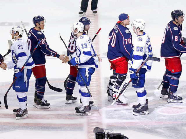 COLUMBUS, OH - APRIL 16: Players from the Columbus Blue Jackets and the Tampa Bay Lightning shake hands after Game Four of the Eastern Conference First Round during the 2019 NHL Stanley Cup Playoffs on April 16, 2019 at Nationwide Arena in Columbus, Ohio. Columbus defeated Tampa Bay 7-3 to win the series 4-0.