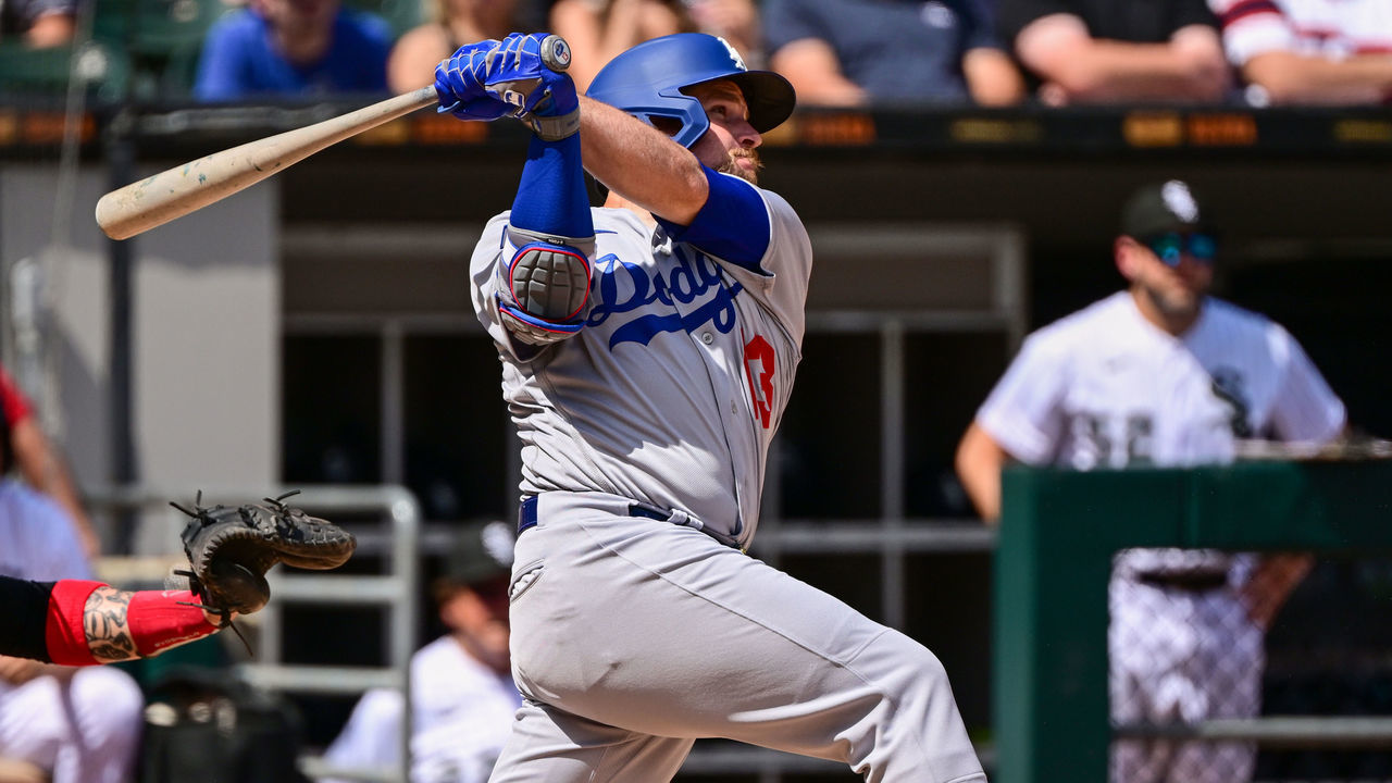 CHICAGO, ILLINOIS - JUNE 09: Max Muncy #13 of the Los Angeles Dodgers hits a two run double in the fifth inning against the Chicago White Sox at Guaranteed Rate Field on June 09, 2022 in Chicago, Illinois.