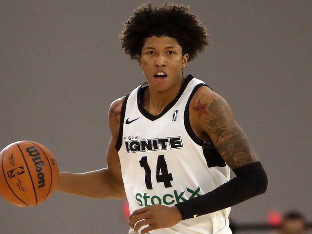 LAS VEGAS, NEVADA - DECEMBER 19: MarJon Beauchamp #14 of the G League Ignite advances the ball against the Grand Rapids Gold during the NBA G League Winter Showcase at the Mandalay Bay Convention Center on December 19, 2021 in Las Vegas, Nevada. NOTE TO USER: User expressly acknowledges and agrees that, by downloading and/or using this photograph, User is consenting to the terms and conditions of the Getty Images License Agreement.