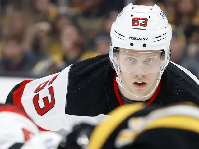 BOSTON, MA - MARCH 31: New Jersey Devils right wing Jesper Bratt (63) eyes the draw during a game between the Boston Bruins and the New Jersey Devils on March 31, 2022, at TD Garden in Boston, Massachusetts.