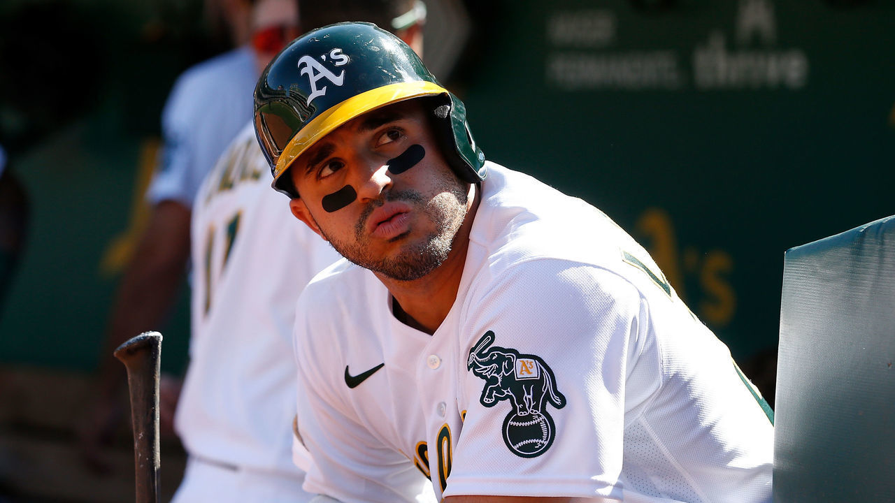 OAKLAND, CALIFORNIA - MAY 14: Ramon Laureano #22 of the Oakland Athletics sits in the dugout during game one of a doubleheader against the Los Angeles Angels at RingCentral Coliseum on May 14, 2022 in Oakland, California.