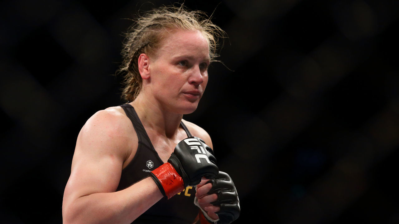Valentina Shevchenko of Kyrgyzstan in action against Taila Santos of Brazil in the womens strawweight title bout during the UFC 275 event at Singapore Indoor Stadium on June 12, 2022 in Singapore.