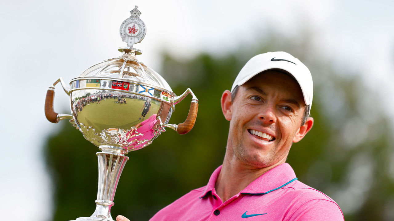 ETOBICOKE, ONTARIO - JUNE 12: Rory McIlroy of Northern Ireland celebrates with the trophy after winning the RBC Canadian Open at St. George's Golf and Country Club on June 12, 2022 in Etobicoke, Ontario.