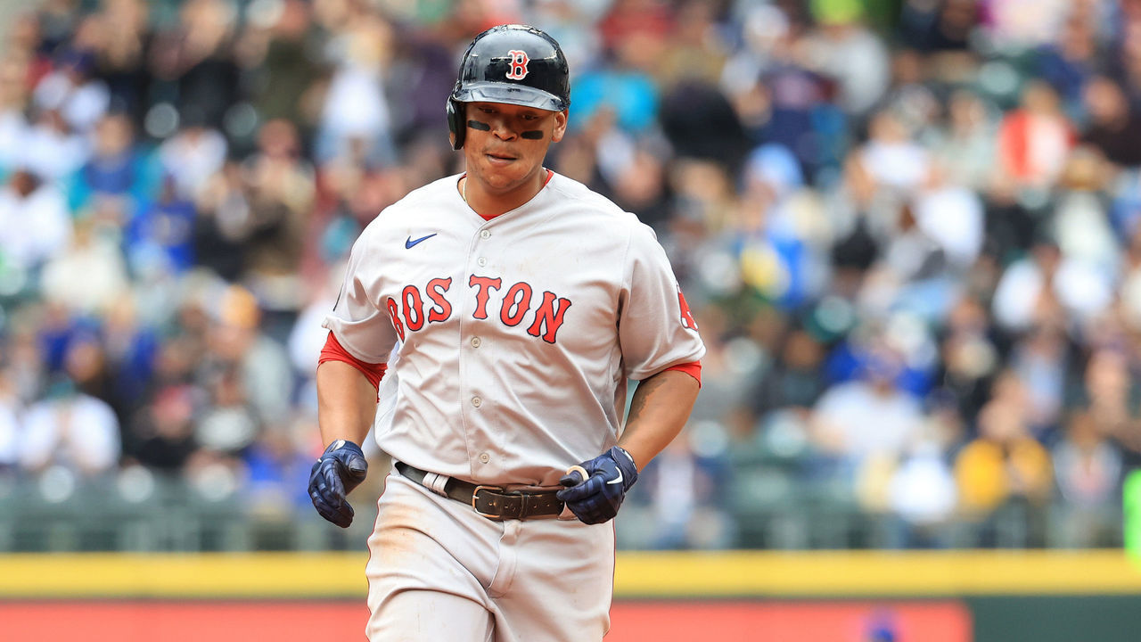SEATTLE, WASHINGTON - JUNE 12: Rafael Devers #11 of the Boston Red Sox runs the bases after hitting a two-run home run against the Seattle Mariners to take a 2-0 lead during the eighth inning at T-Mobile Park on June 12, 2022 in Seattle, Washington.