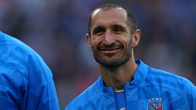 Italy's defender Giorgio Chiellini smiles in the line-up ahead of the 'Finalissima' International friendly football match between Italy and Argentina at Wembley Stadium in London on June 1, 2022. - The Azzurri face the South American continental champions in the inaugural Finalissima at Wembley.