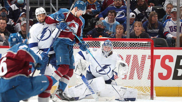 DENVER, COLORADO - FEBRUARY 10: Goaltender Andrei Vasilevskiy #88 of the Tampa Bay Lightning looks to make a save against the Colorado Avalanche next to teammate Pierre-Edouard Bellemare #41 and Valeri Nichushkin #13 at Ball Arena on February 10, 2022 in Denver, Colorado.