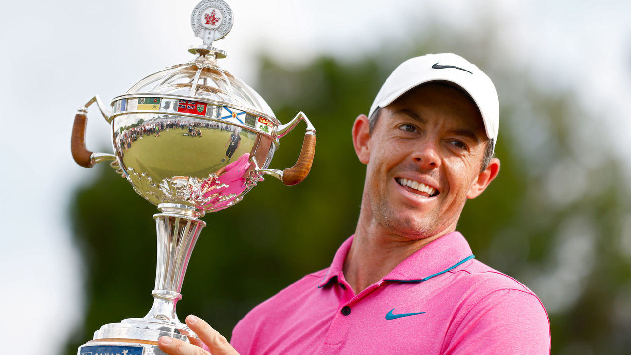 ETOBICOKE, ONTARIO - JUNE 12: Rory McIlroy of Northern Ireland celebrates with the trophy after winning the RBC Canadian Open at St. George's Golf and Country Club on June 12, 2022 in Etobicoke, Ontario.