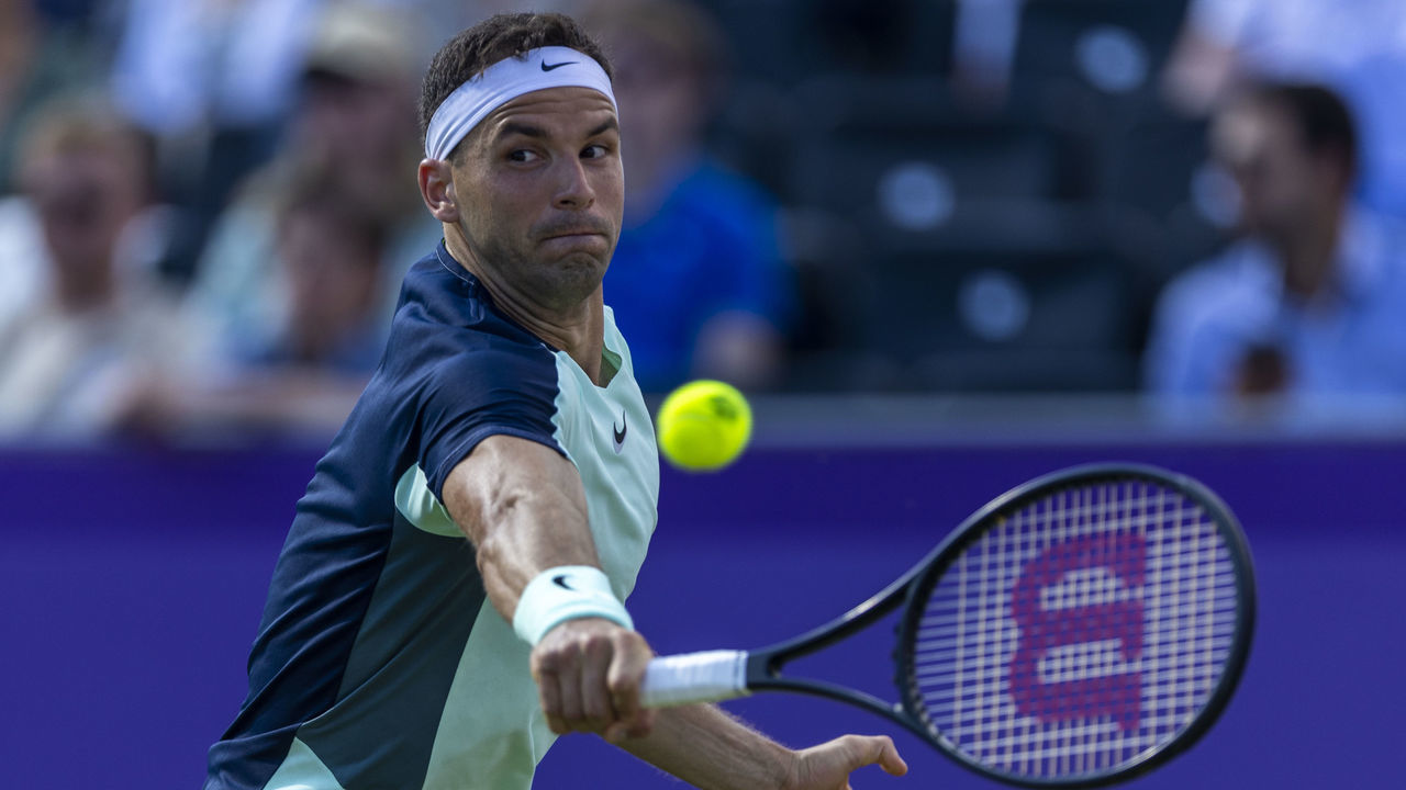 Grigor Dimitrov in action on day one of the cinch Championships at The Queen's Club, London. Picture date: Monday June 13, 2022.