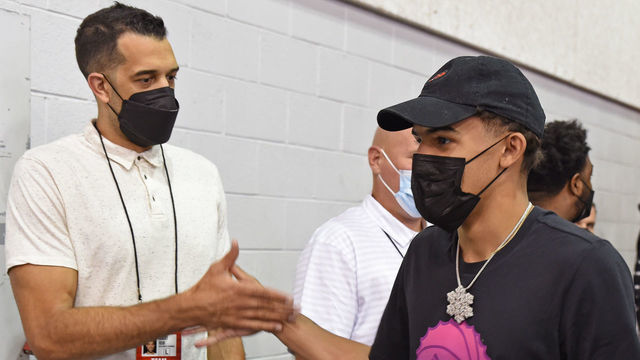LAS VEGAS, NV - AUGUST 8: Landry Fields and Trae Young #11 of the Atlanta Hawks shake hands during Day 1 of the 2021 Las Vegas Summer League on August 8, 2021 at the Thomas & Mack Center in Las Vegas, Nevada. NOTE TO USER: User expressly acknowledges and agrees that, by downloading and/or using this Photograph, user is consenting to the terms and conditions of the Getty Images License Agreement. Mandatory Copyright Notice: Copyright 2021 NBAE