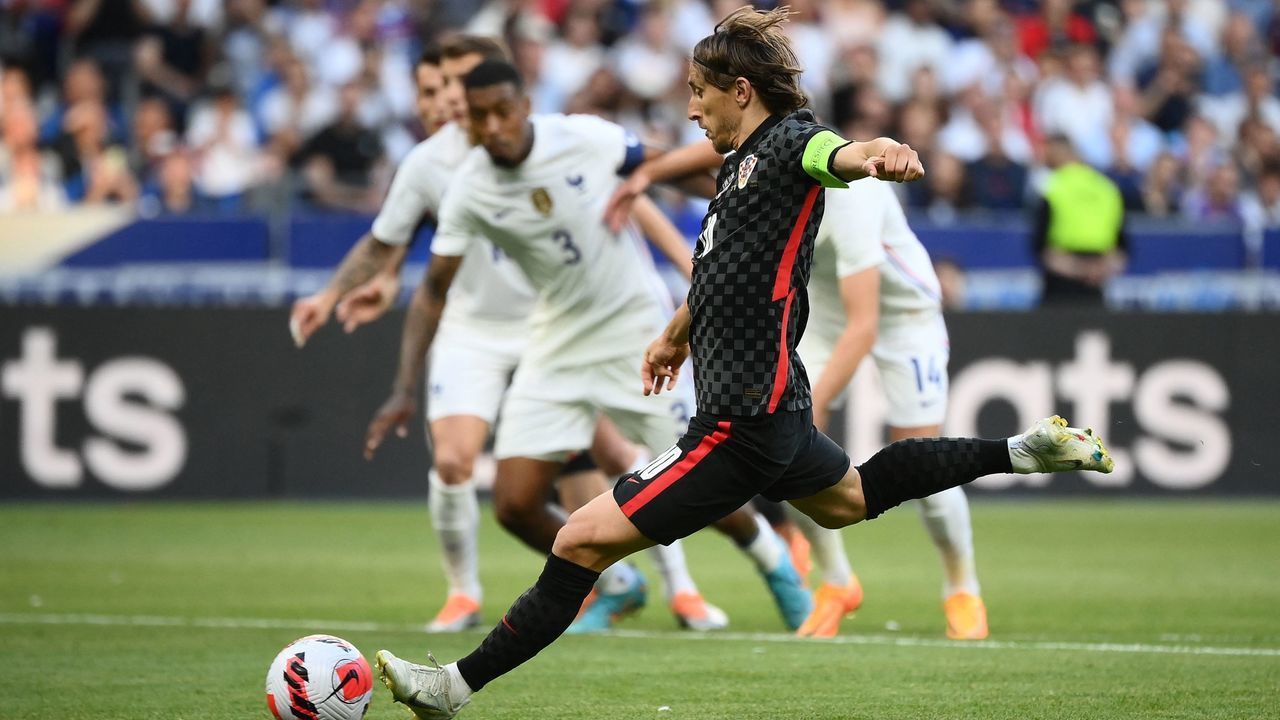 Croatia's midfielder Luka Modric kicks to score his team's first goal on a penalty during the UEFA Nations League - League A Group 1 football match between France and Croatia at the Stade de France in Saint-Denis, on the outskirts of Paris on June 13, 2022.