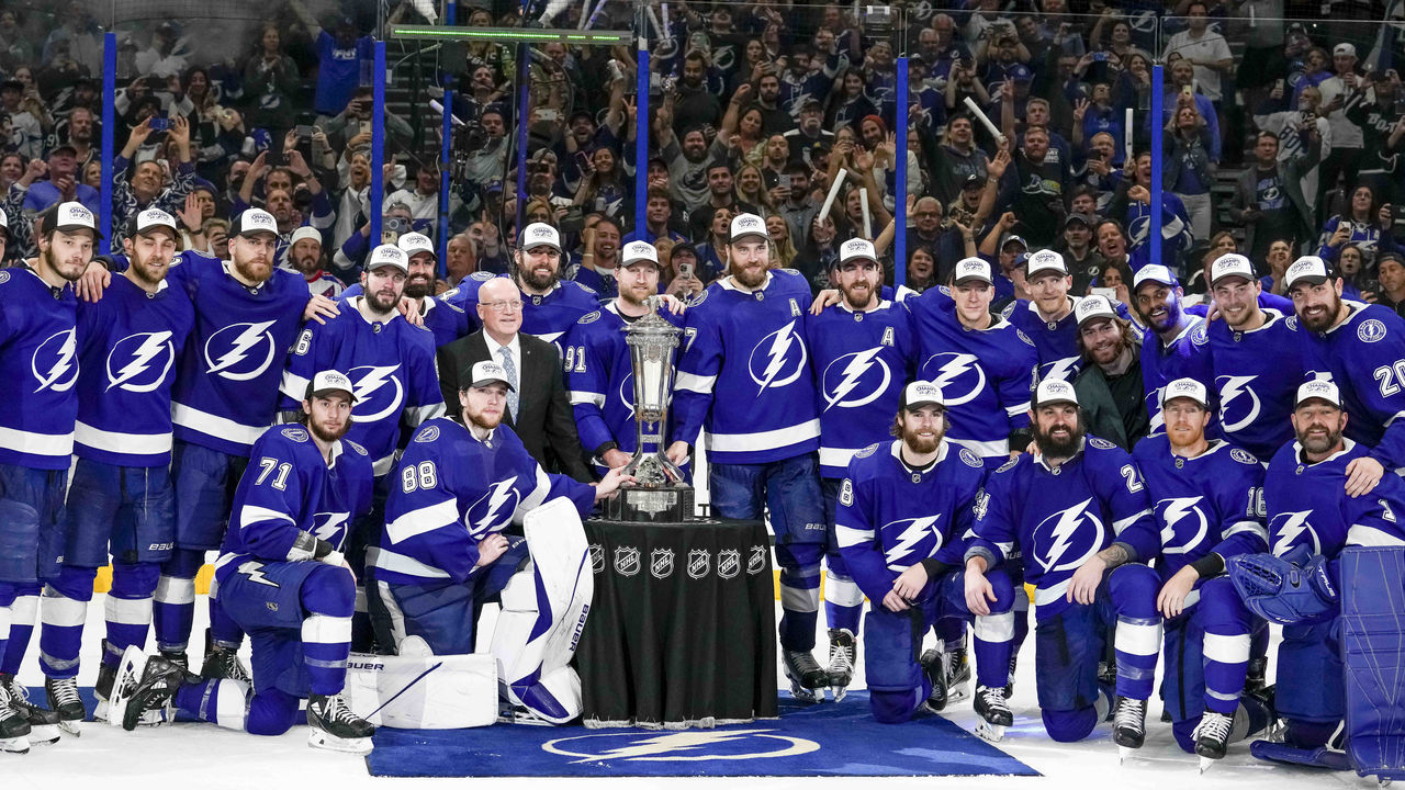 TAMPA, FL - JUNE 11: Tampa Bay Lightning team with the Prince of Wales Trophy during the NHL Hockey Eastern Conference Finals Game 6 of the Stanley Cup Playoffs between Tampa Bay Lightning and the New York Rangers on June 11th, 2022 at Amalie Arena in Tampa Florida