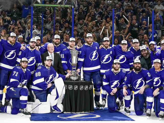 TAMPA, FL - JUNE 11: Tampa Bay Lightning team with the Prince of Wales Trophy during the NHL Hockey Eastern Conference Finals Game 6 of the Stanley Cup Playoffs between Tampa Bay Lightning and the New York Rangers on June 11th, 2022 at Amalie Arena in Tampa Florida