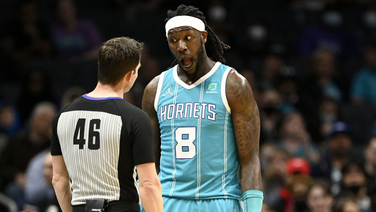 CHARLOTTE, NC - MARCH 05: Montrezl Harrell #8 of the Charlotte Hornets has a word with official Ben Taylor #46 in the second quarter at Spectrum Center on March 5, 2022 in Charlotte, North Carolina.