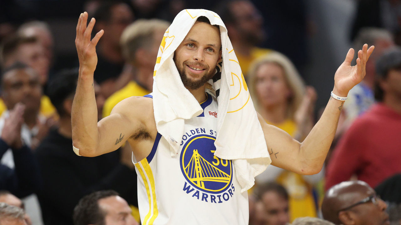 SAN FRANCISCO, CALIFORNIA - JUNE 13: Stephen Curry #30 of the Golden State Warriors reacts after teammate Draymond Green #23 shot a free throw during the second quarter against the Boston Celtics in Game Five of the 2022 NBA Finals at Chase Center on June 13, 2022 in San Francisco, California. NOTE TO USER: User expressly acknowledges and agrees that, by downloading and/or using this photograph, User is consenting to the terms and conditions of the Getty Images License Agreement.