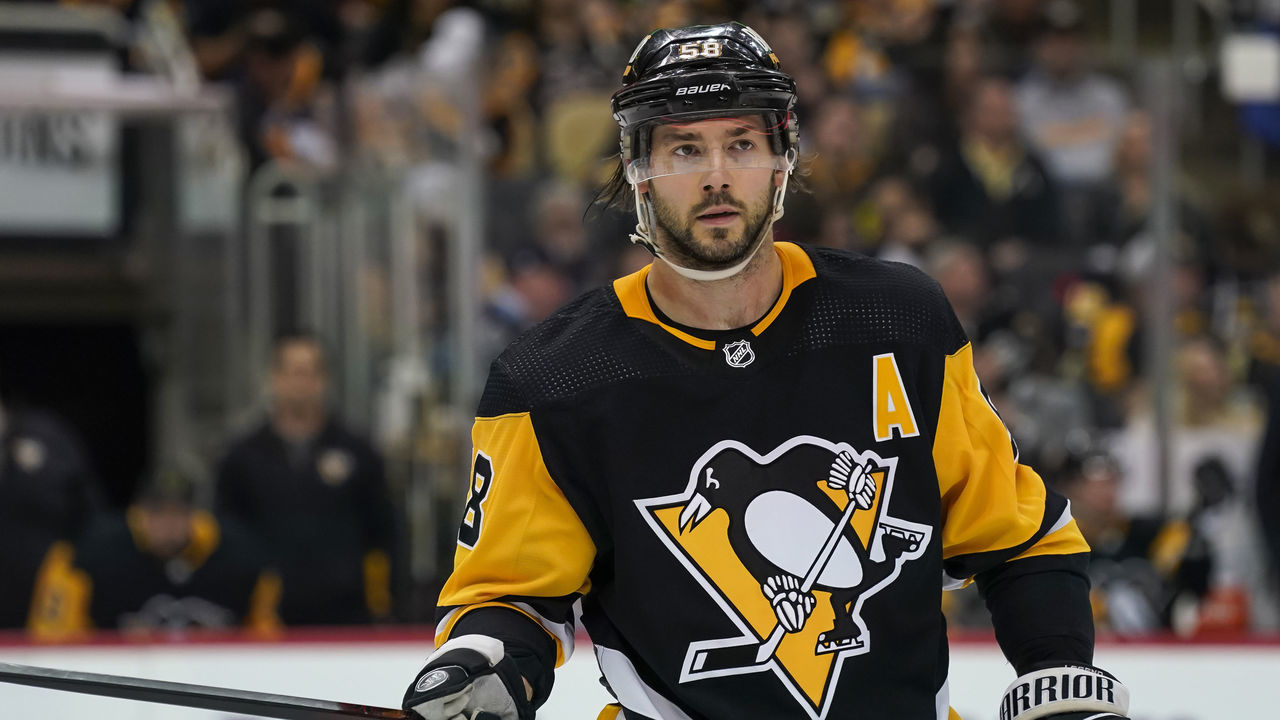 PITTSBURGH, PA - APRIL 29: Pittsburgh Penguins Defenseman Kris Letang (58) looks on during the second period in the NHL game between the Pittsburgh Penguins and the Columbus Blue Jackets on April 29, 2022, at PPG Paints Arena in Pittsburgh, PA.