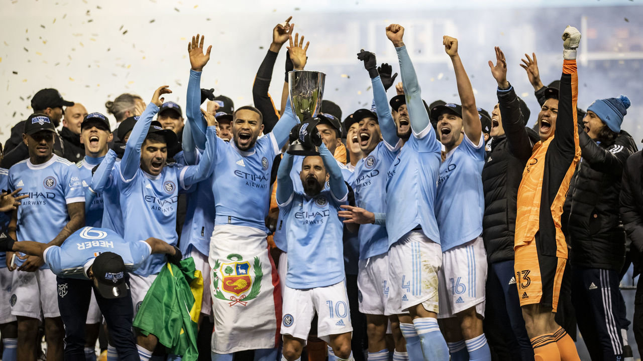 CHESTER, PA - DECEMBER 05: Maximiliano Moralez #10 of New York City FC holds the Eastern Conference Trophy and celebrates after winning the 2021 Audi MLS Cup Eastern Conference Final match against the Philadelphia Union at Subaru Park on December 05, 2021 in Chester, Pennsylvania.