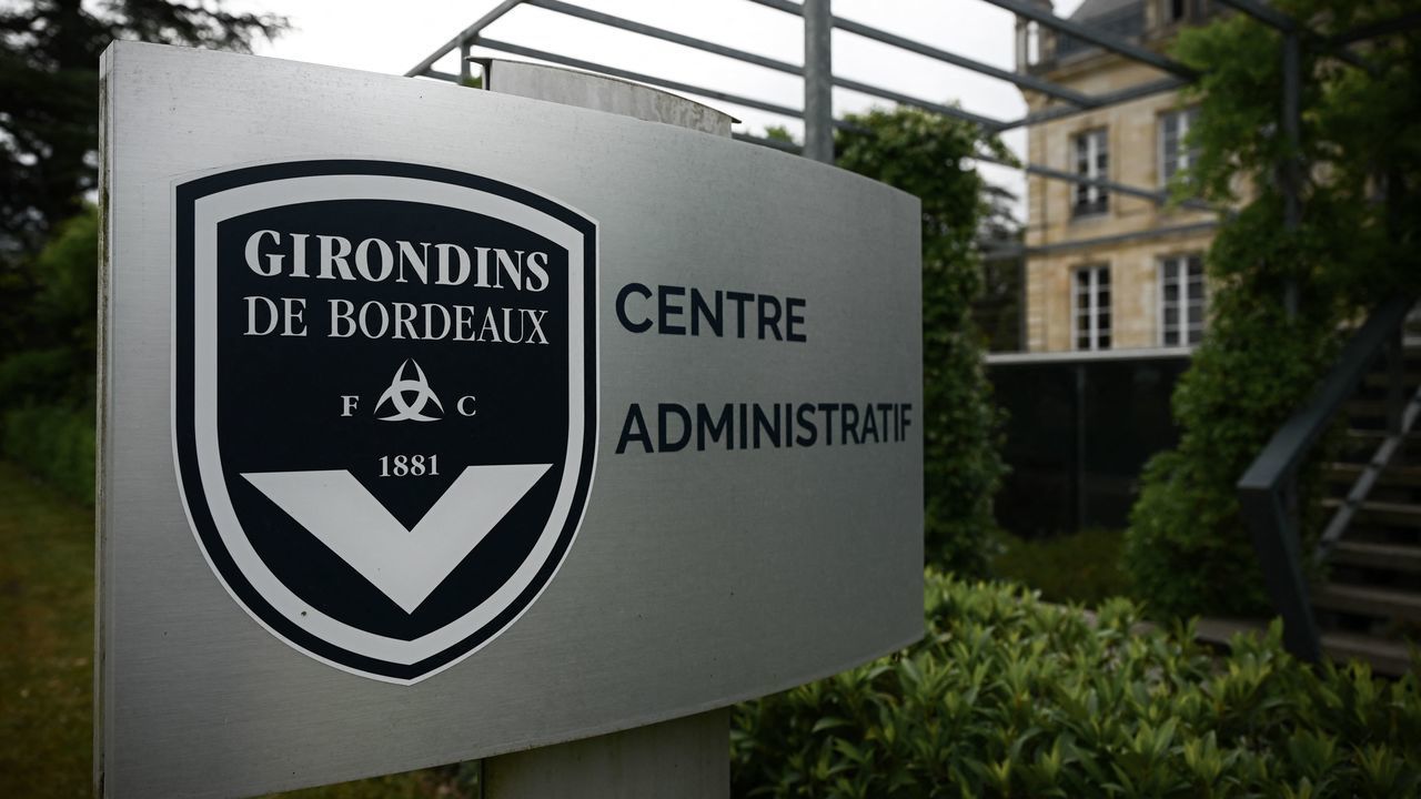 This general view taken on May 19, 2022, shows a sign with a logo in front of the chateau of FC Girondins de Bordeaux at the club's training ground in Le Haillan, near Bordeaux, south-western France.
