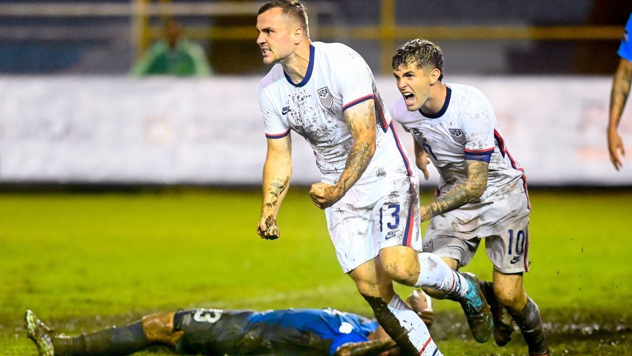 USA's Christian Pulisic (R) and Jordan Morris celebrate a goal against El Salvador during their Concacaf Nations League football match at the Cuscatlan Stadium, in San Salvador, on June 14, 2022.