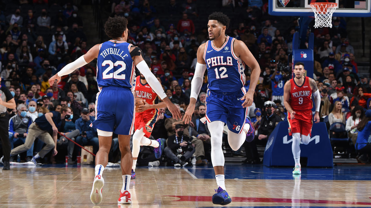 PHILADELPHIA, PA - JANUARY 25: Matisse Thybulle #22 of the Philadelphia 76ers and Tobias Harris #12 of the Philadelphia 76ers high-five during a game against the New Orleans Pelicans on January 25, 2022 at Wells Fargo Center in Philadelphia, Pennsylvania. NOTE TO USER: User expressly acknowledges and agrees that, by downloading and/or using this Photograph, user is consenting to the terms and conditions of the Getty Images License Agreement. Mandatory Copyright Notice: Copyright 2022 NBAE