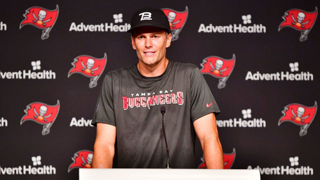 TAMPA, FLORIDA - JUNE 09: Tom Brady #12 of Tampa Bay Buccaneers answers questions at a press conference following the 2022 Buccaneers minicamp at AdventHealth Training Center on June 09, 2022 in Tampa, Florida.