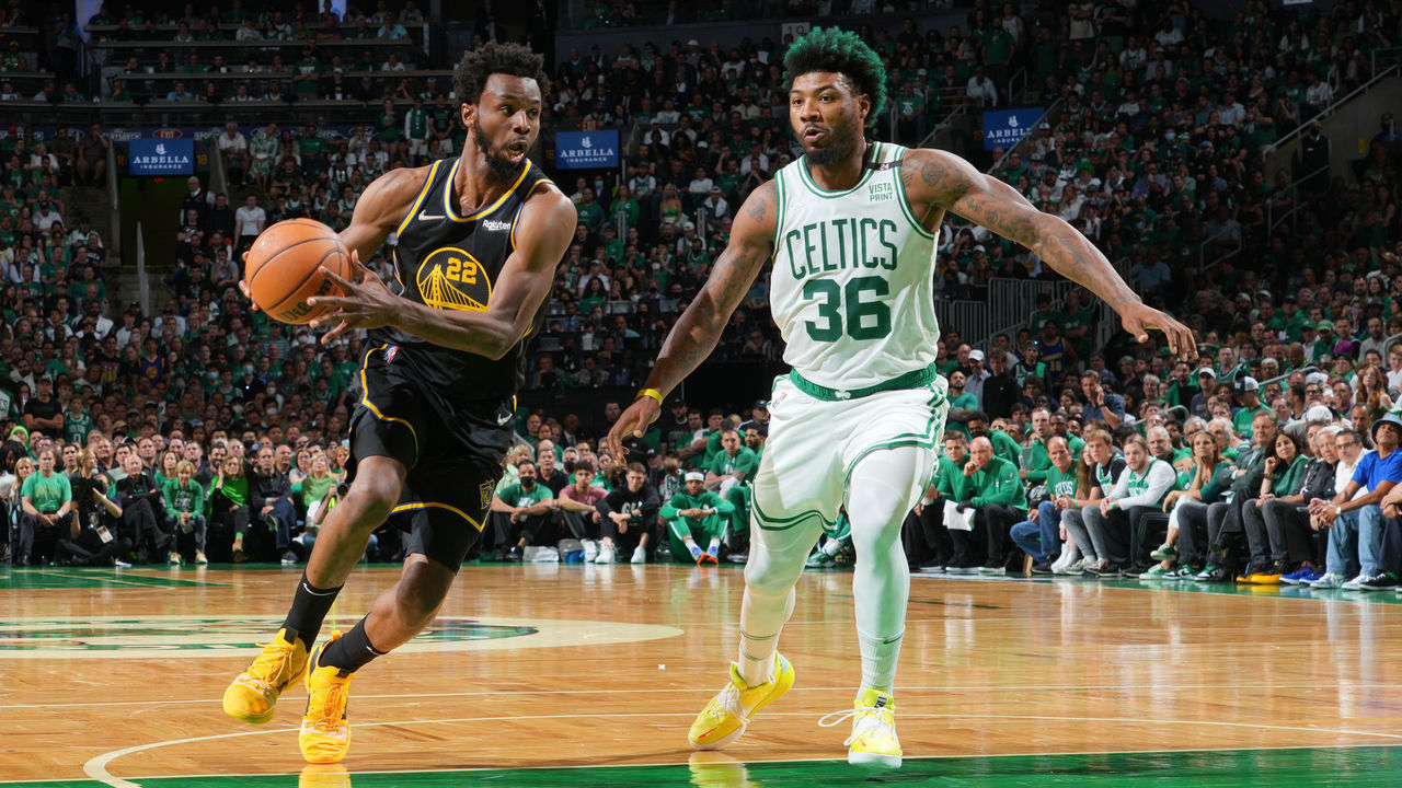 BOSTON, MA - JUNE 8: Marcus Smart #36 of the Boston Celtics plays defense on Andrew Wiggins #22 of the Golden State Warriors during Game Three of the 2022 NBA Finals on June 8, 2022 at the TD Garden in Boston, Massachusetts. Mandatory Copyright Notice: Copyright 2022 NBAE