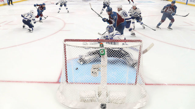 DENVER, COLORADO - JUNE 15: Andre Burakovsky #95 of the Colorado Avalanche scores a goal against Andrei Vasilevskiy #88 of the Tampa Bay Lightning during overtime to win Game One of the 2022 Stanley Cup Final 4-3 at Ball Arena on June 15, 2022 in Denver, Colorado.