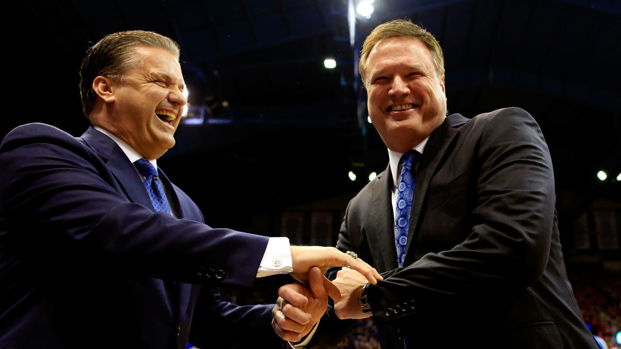LAWRENCE, KS - JANUARY 30: Head coach John Calipari of the Kentucky Wildcats and head coach Bill Self of the Kansas Jayhawks greet each other prior to the game at Allen Fieldhouse on January 30, 2016 in Lawrence, Kansas.