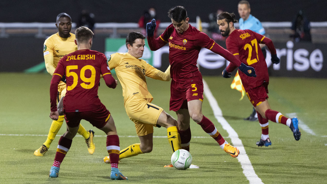 BODO, NORWAY - APRIL 07: Hugo Vetlesen of FK Bodo/Glimt challenges Roger Ibanez Da Silva of AS Roma for the ball during the UEFA Conference League Quarter Final Leg One match between FK Bodo/Glimt and AS Roma at Aspmyra Stadium on April 7, 2022 in Bodo, Norway.