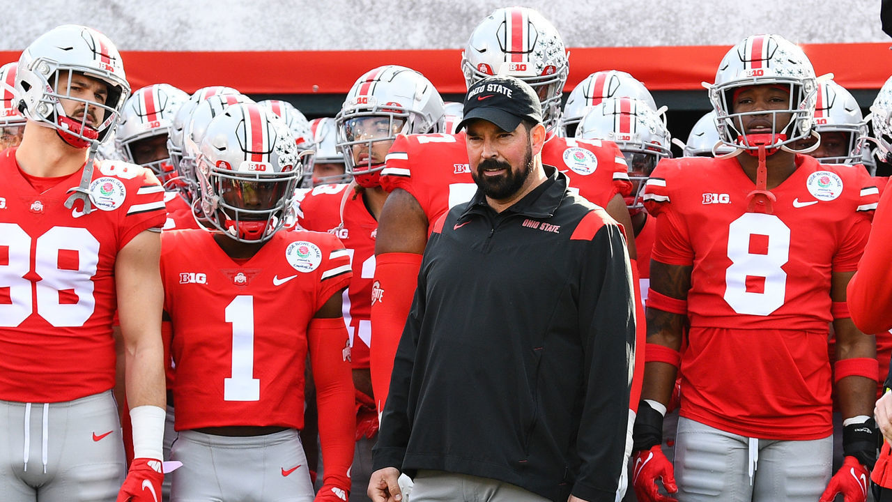 PASADENA, CA - JANUARY 01: Ohio State Buckeyes head coach Ryan Day leads his team out to the field before the Rose Bowl game between the Ohio State Buckeyes and the Utah Utes on January 1, 2022 at the Rose Bowl in Pasadena, CA.
